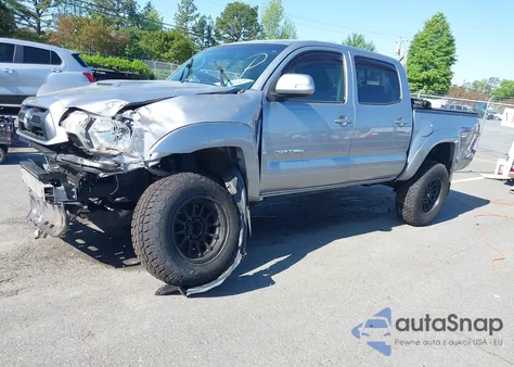 2015 Toyota Tacoma Base V6 z USA, uszkodzony, nr VIN 3TMLU4EN1FM185873